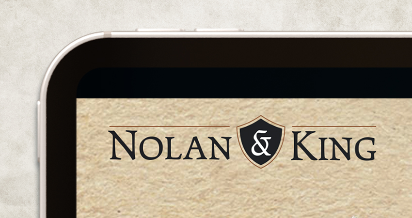Logo mockup on the client website for Nolan and King