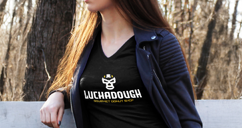 Luchadough logo mocked up on a woman's t-shirt